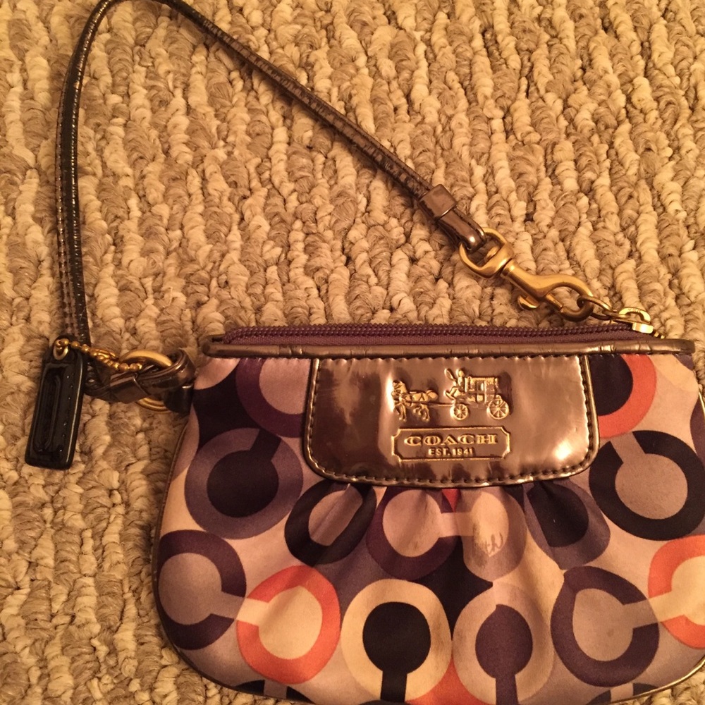 Multi colored coach wristlet
